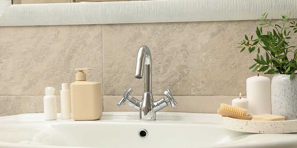 Clean white bathroom vanity and sink showing a smooth, professional sink glazing finish.
